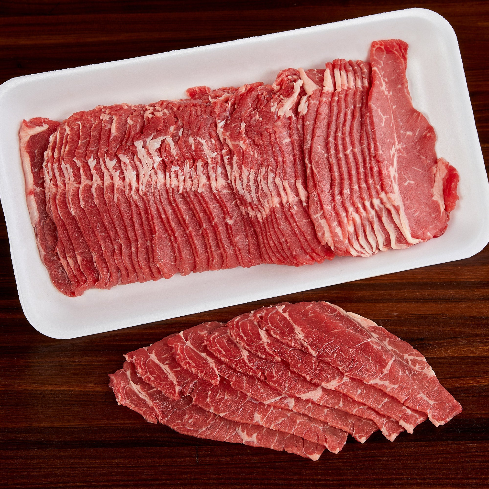 BEEF LOIN NEW YORK PREVIOUSLY FROZEN (SHABU SHABU) PER LB
