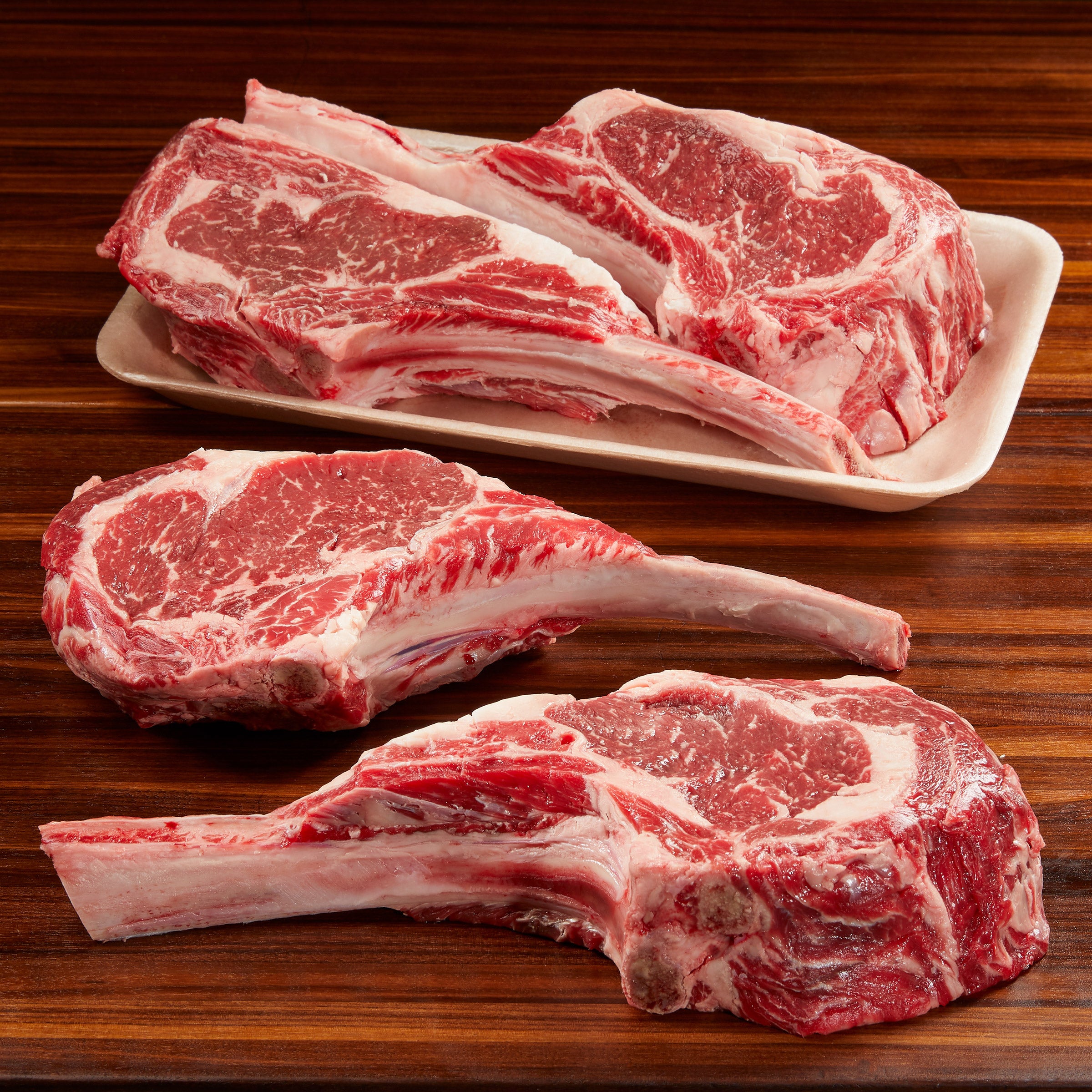 BEEF RIBEYE STEAK BONE-IN USDA CHOICE PER LB