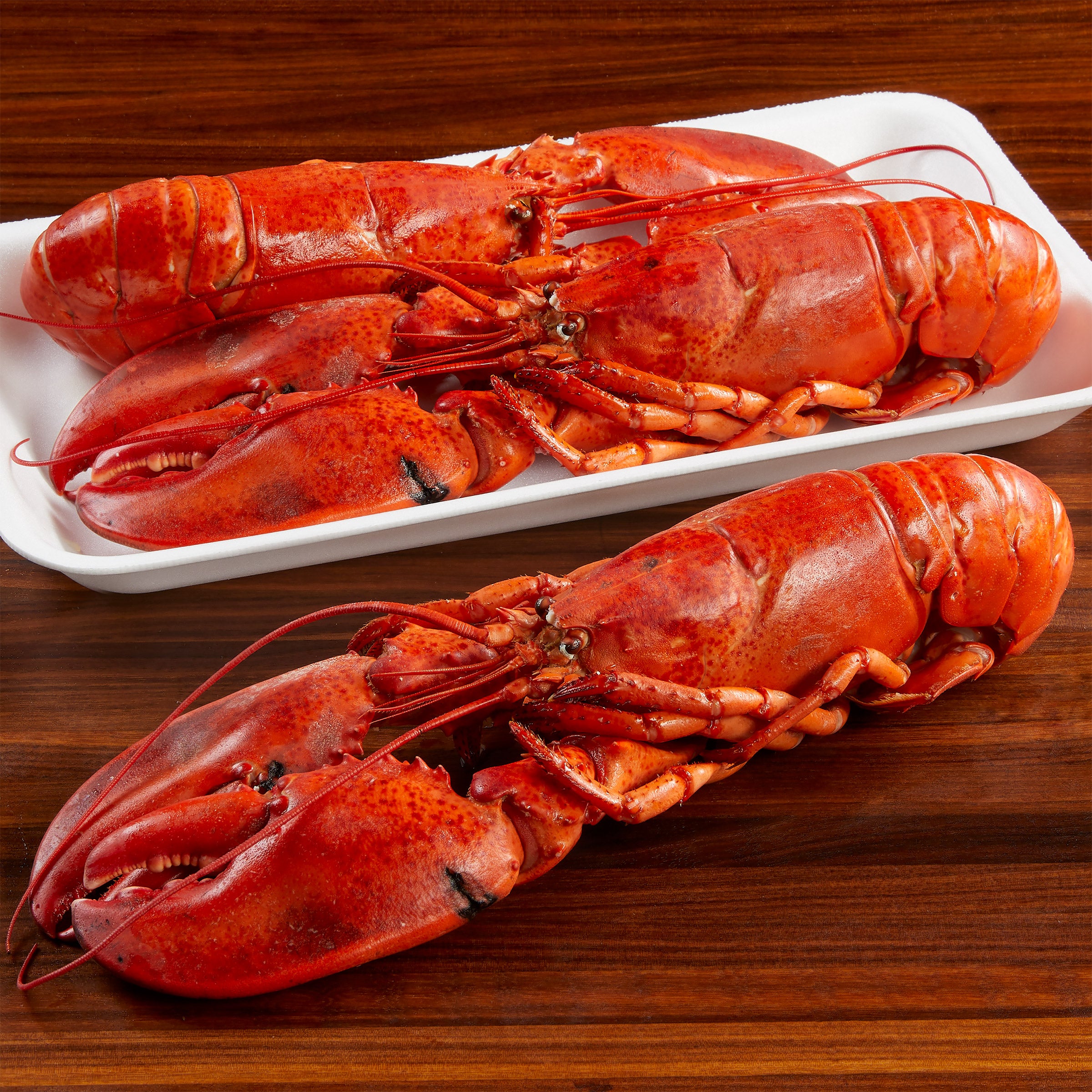 WILD WHOLE COOKED LOBSTER PREVIOUSLY FROZEN PER LB - Image 1