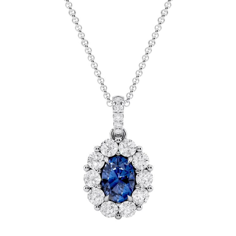 18kt White Gold VS2, I 0.75 CTW Diamond & 7x5mm Blue Sapphire Pendant