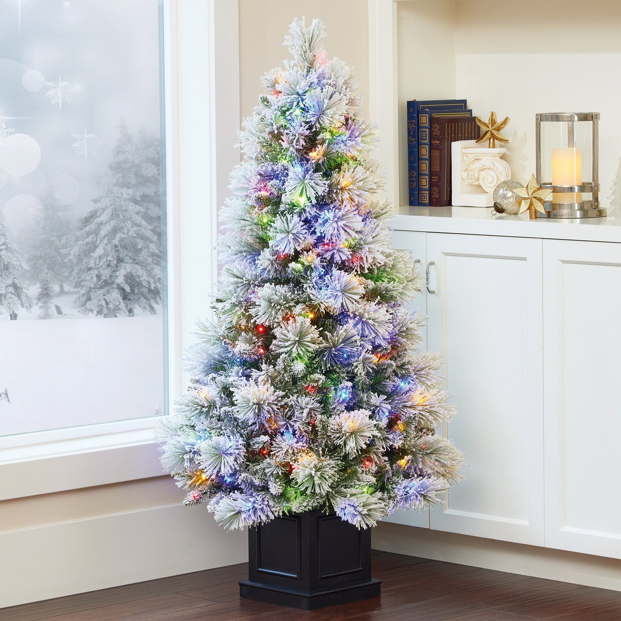 4.5' Pre-Lit Glitter Flocked Potted Tree - Image 1