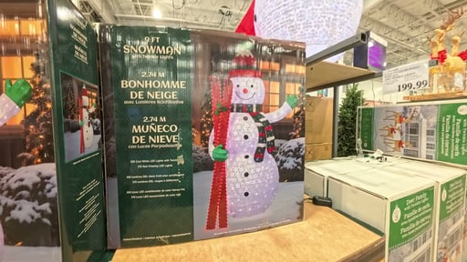 9' Pop-Up LED Snowman with Skis and Twinkle Lights